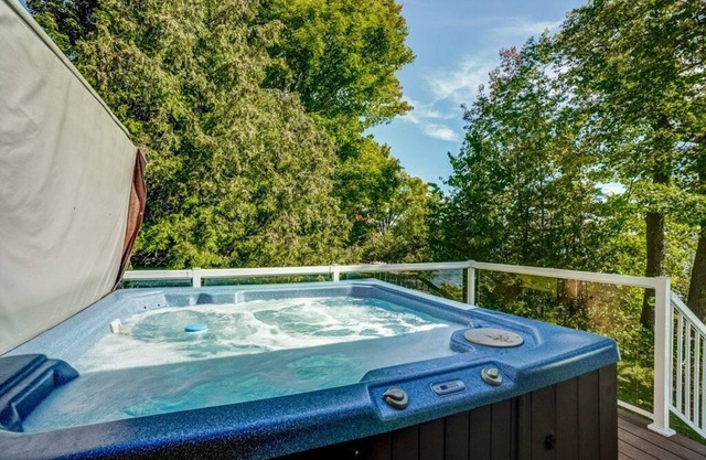 Luxe Lakefront 4-Season Escape on Head Lake- Hot Tub, Sauna, Trails & Epic Dock!