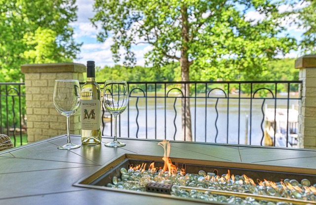 Luxe Lakefront Estate with Beach + Hot Tub + Firepit + Dock