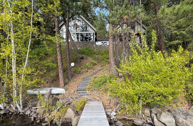 Luxe, lakefront home with dock, amazing lake views, patio & fireplace