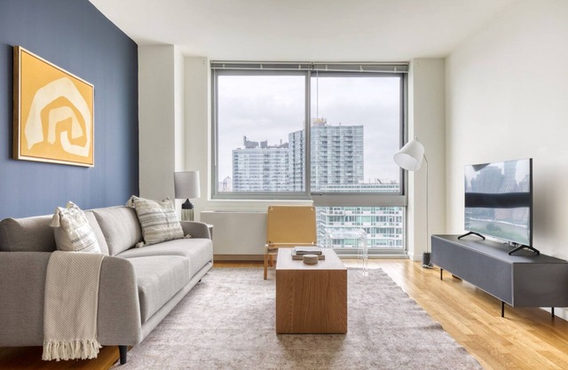 Luxe LIC 1BR w/ W/D, Elevator & Doorman, near East River, by Blueground