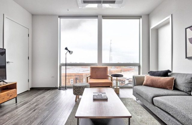 Luxe Logan Square 2BR w/ Gym, Roof Deck, 1 block to L, by Blueground (ID #CHI371)