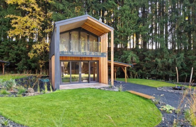 Luxe Timber Lodge & Relaxing Bath” by Interhome