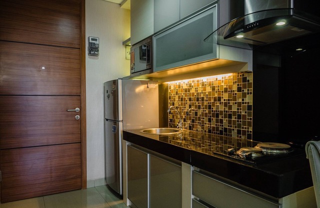 Luxurious 1BR At Dago Suites Apartment