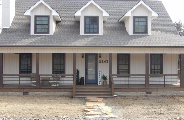 Luxurious 5-bedroom lakefront house with 3 master bedrooms & a wrap-around porch