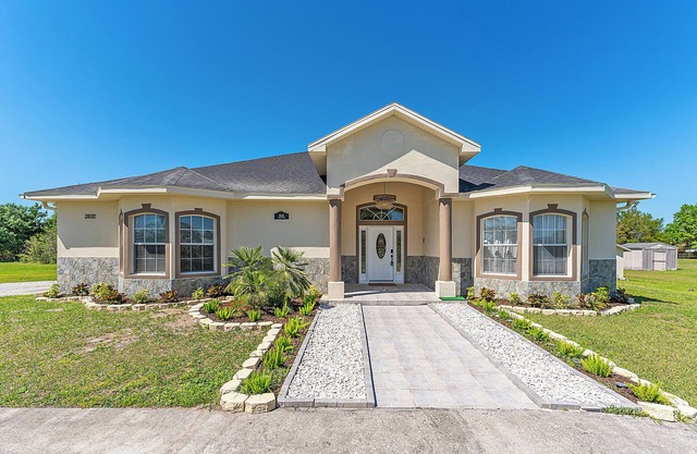 Luxurious 5-Bedroom Retreat: Gold Accents, Modern Amenities, & Fun!"
