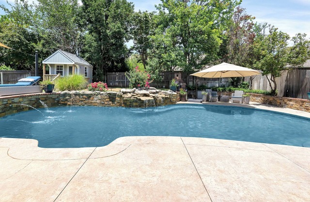 Luxury 5 Bedroom Oasis w/ Pool, Waterfall, & More in Tulsa