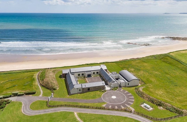 Luxury 6 bedroom home with indoor pool right on the beach