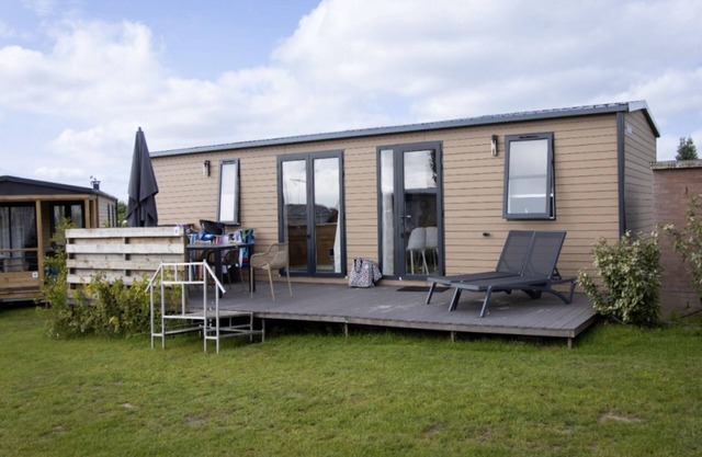 luxury chalet on a cosy campsite near the sea