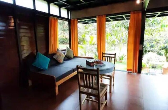 Luxury cottages in lush green panoramic windows