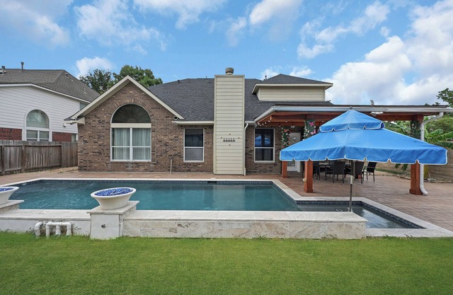 Luxury Dream Home with Pool and Surround Sound System. Close to Splash pad, etc.