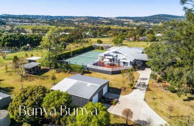Luxury Estate set over 2 acres w/ Tennis Court