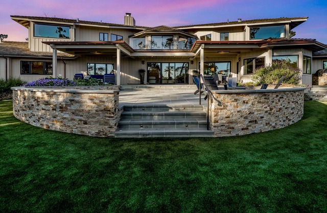 Luxury estate with ocean views, gourmet kitchen, & stunning primary suites