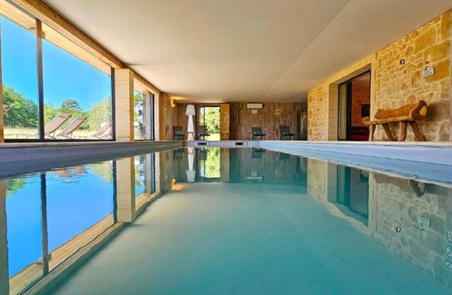 Luxury holiday home with an indoor pool and spa