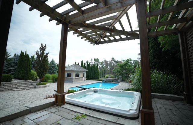 "Luxury Home with Pool and Outdoor Bar"