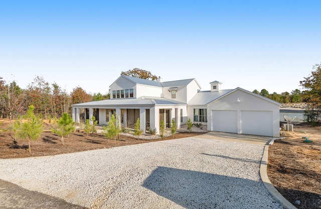 Luxury home with private beach, pool, firepit, & chef's kitchen