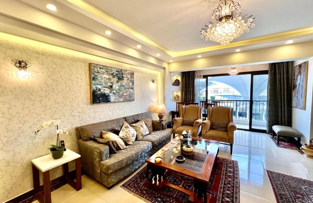 Luxury hotel apartment with pools in front AUC