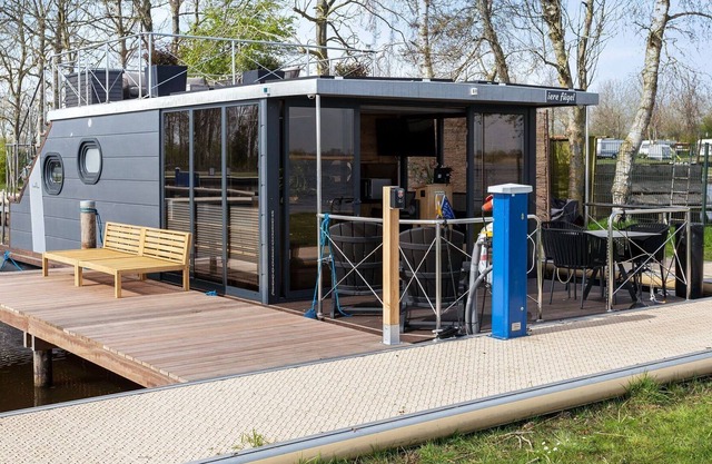 Casa flotante de lujo con vistas sobre el lago, incluidas tablas de Sup