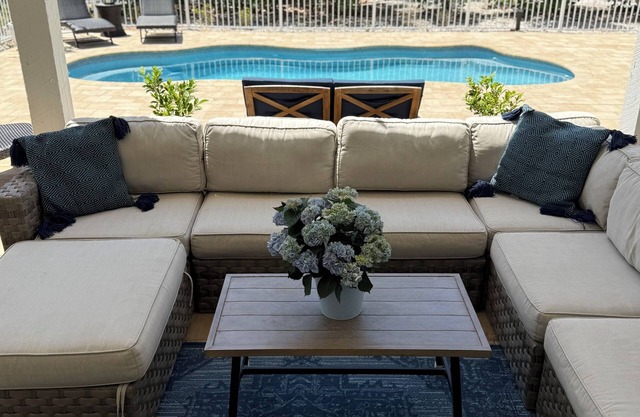 Luxury island home with a private pool, game area, golf carts, club access.