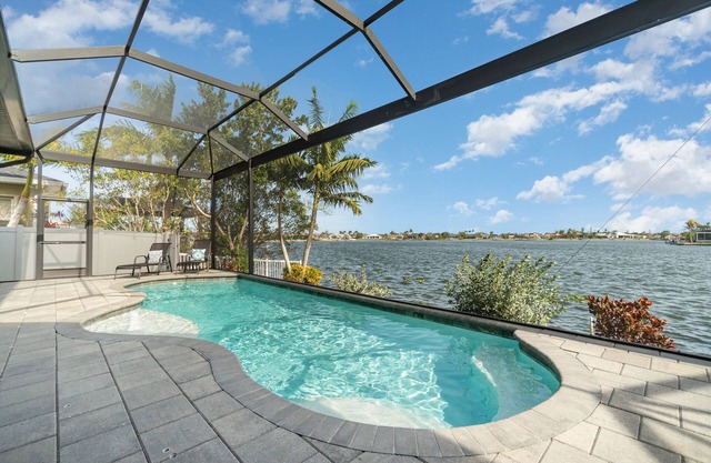 Luxury Lakeside Living w/Outdoor Kitchen & Heated Pool