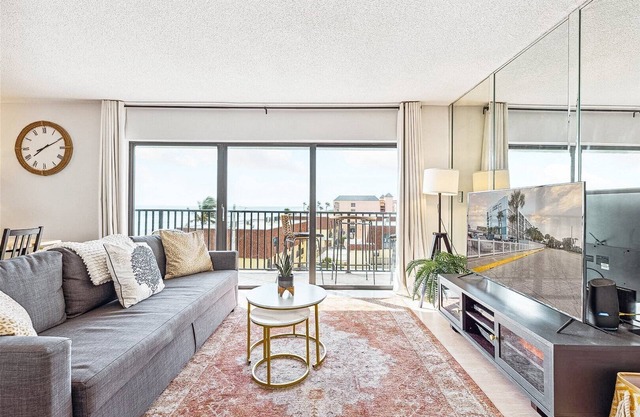 Luxury Oceanfront Getaway on the Top Floor Penthouse Corner Unit Steps from the Beach