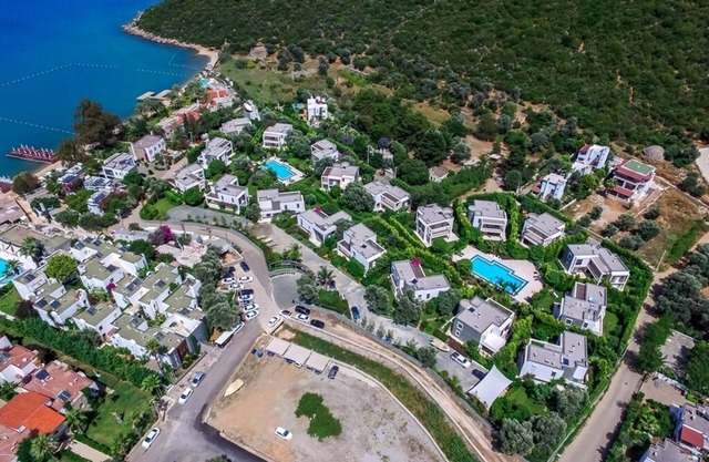 Casa familiar privada de lujo con muelle privado y playa