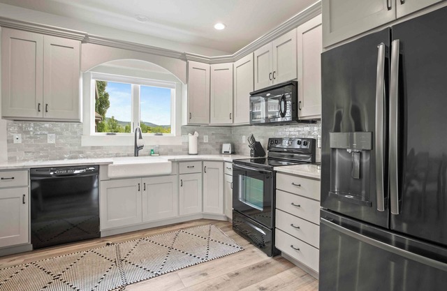 Luxury Retreat by InvitedHome | Fly Fishing, Two Kitchens, Hot Tub, Game Room