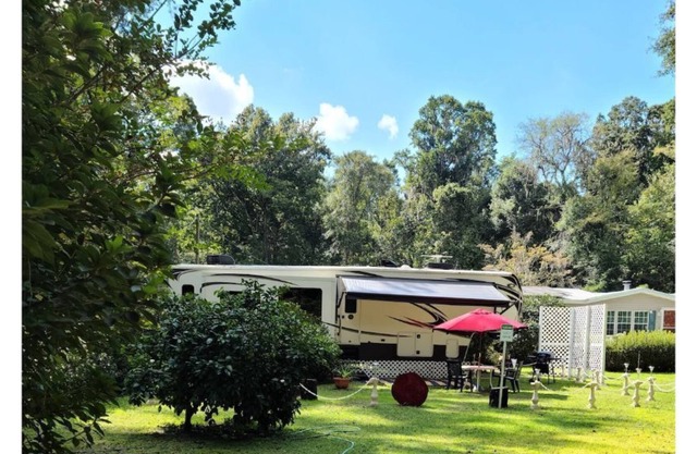 Luxury RV on private lot. Peaceful and charming.
