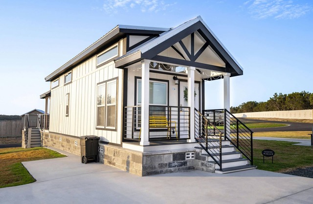 Luxury Tiny Home 'TXFirefly88' Features Floor-to-Ceiling Hill Views, Pond-Side Screened Porch, and W