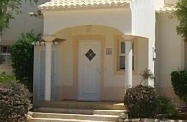 Casa de lujo en complejo de golf con piscina comunitaria