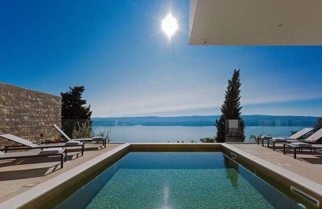 Luxury Villa Gust with sea view, pool, hot tub, cinema and vine bar