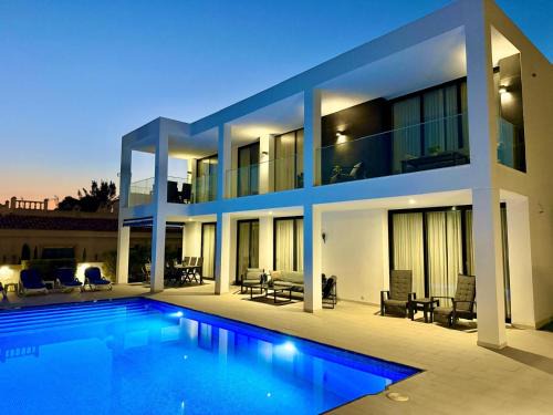 Luxury villa with large swimming pool and outdoor area