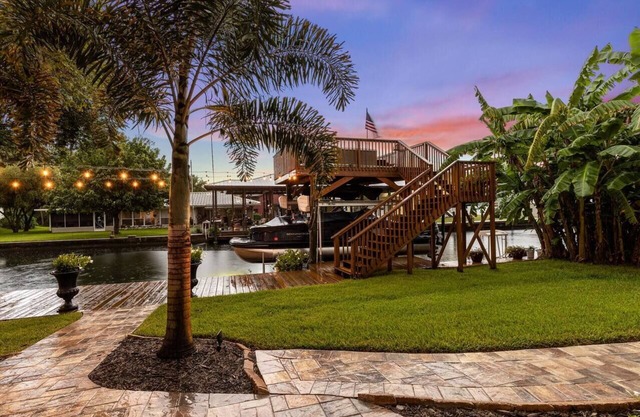 Luxury Waterfront Pool Home w/spa & deep canal