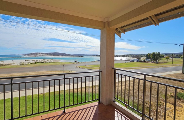 Luxury Waterfront | Sleeps 4 | Resort Pool | Wifi