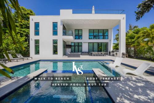LVS Villa Blanco 5BR Coastal Oasis with Rooftop Sunset Deck Heated Pool Spa & Walk-to-Beach Access