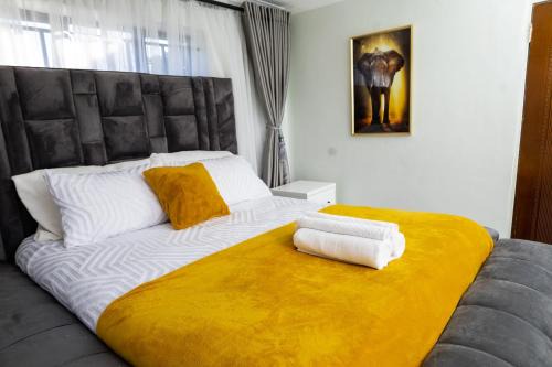 M&M SIGNATURE HOME 4 BEDROOMS SLEEPS 8 in RUWA LUXURIOUS AMENITIES DECO AND GAZEBO