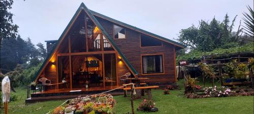 Magic Cabin in Jardín de Dota A real Costa Rican Farm experience with Breakfast included Trout fishing in the lagoon Fruit tasting & beautiful garden with farm animals