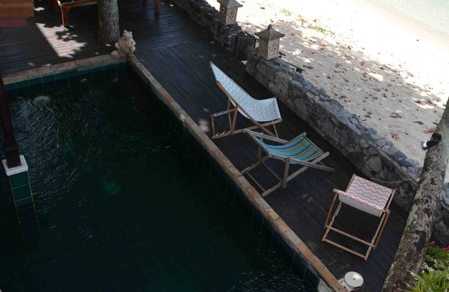 los pies en el agua de las casas magníficas Villa de lujo directamente en la playa