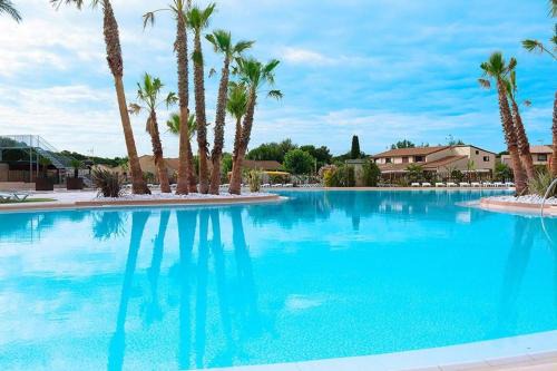 Maison avec piscine chauffée de Pâques à la toussaint accès animation & parc aquatique de juin à fin septembre