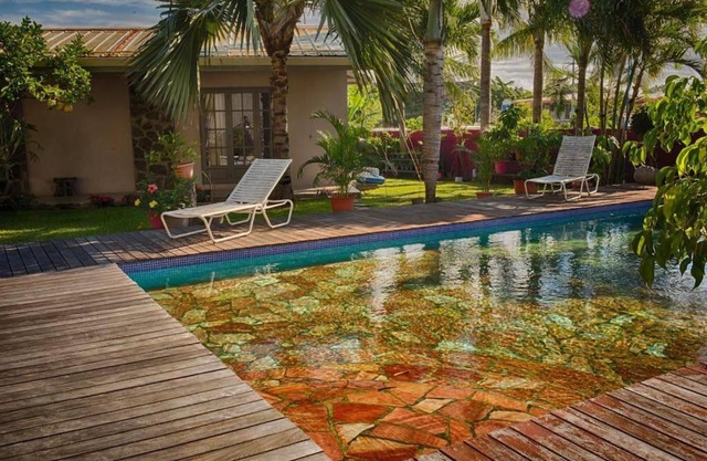 Maison d'invités dans jardin tropical avec piscine à Tahiti