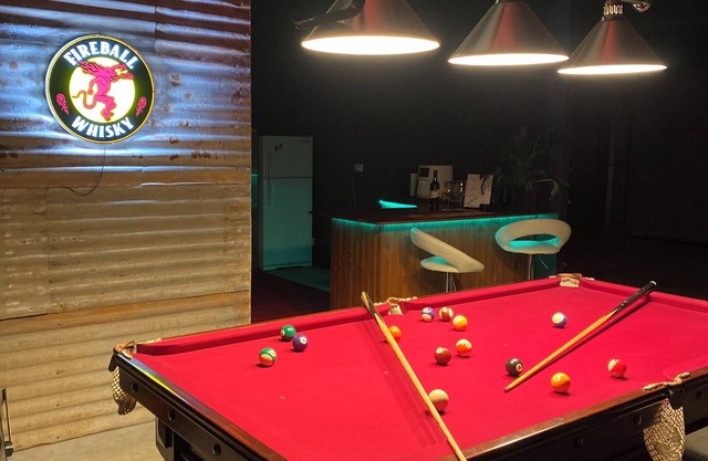 Man Cave with a touch of Lux... and an open fire.