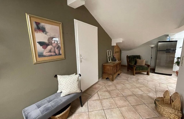Apartamento Mansard - Schober, casa