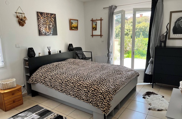 Master suite in single-storey house with terrace