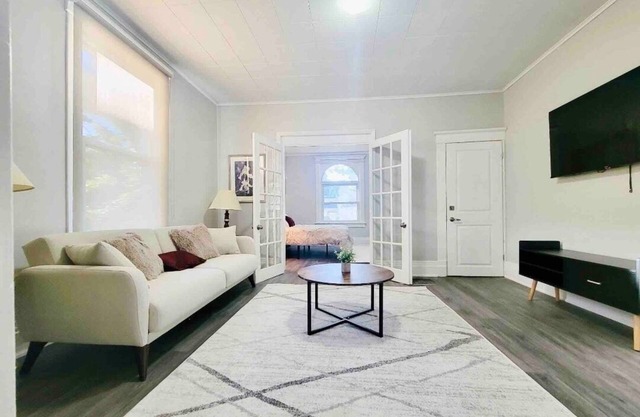 Mid century apartment with private backyard and deck