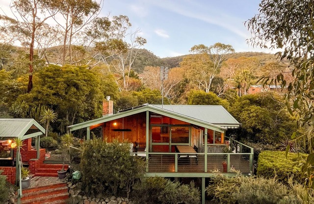 Mid century modern style home with pool and sauna. Pet friendly!