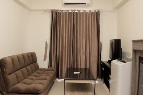 Minimalist and Cozy 3BR at Meikarta Apartment By Travelio
