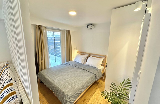 Minimalist Seaside Apartment with Patio and Parking - Blue Zone Homes
