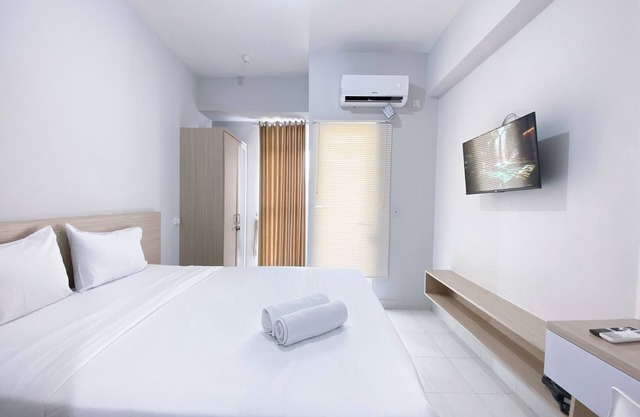 Minimalistic and Cozy Studio Amartha View Apartment