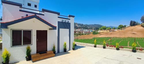 Mithra Cottages Ooty Individual Villa Breakfast Complementary, Campfire Available, BBQ Available