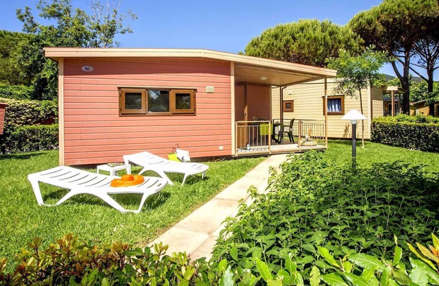Casa vacacional con jardín, aire acondicionado y a 150 metros del mar
