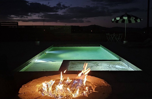Modern 1-bedroom studio with peaceful mountain views, firepit, pool and hot tub.